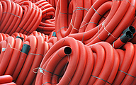 Stock coiled plastic pipe